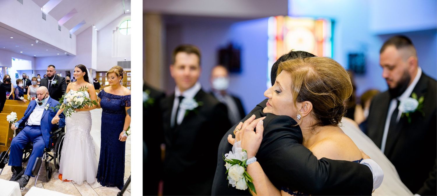 Wedding guests embrace during an emotional ceremony moment in a church setting with modern lighting.