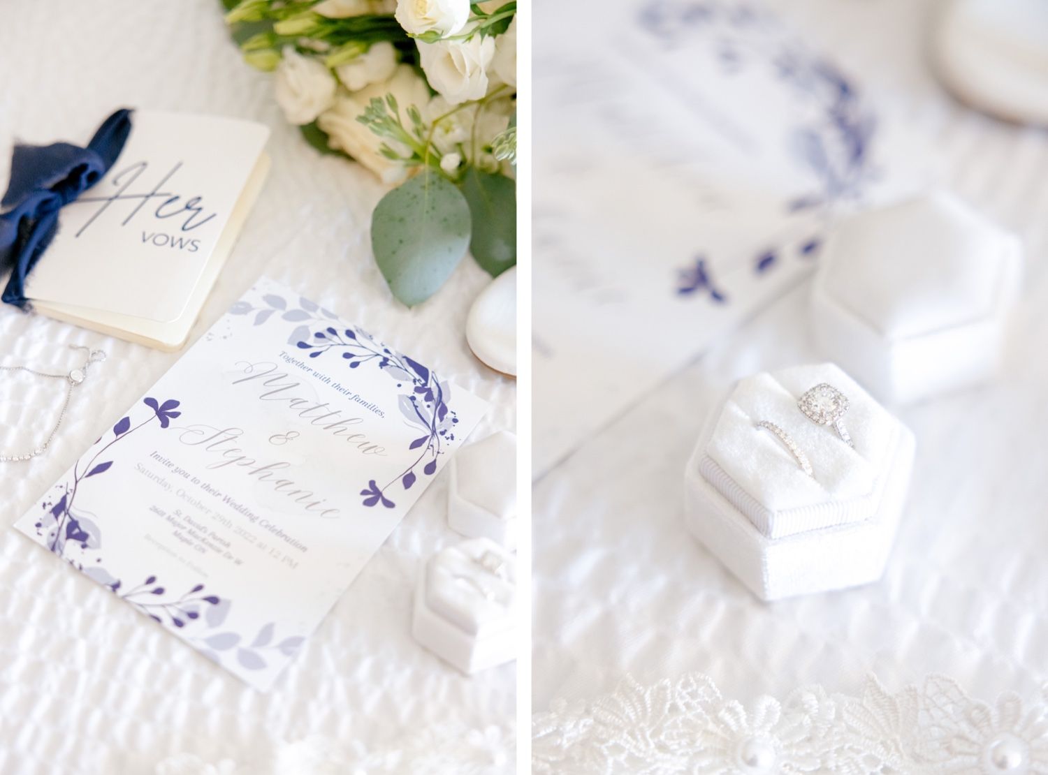 Wedding stationery with navy blue accents and white ring boxes on lace tablecloth.