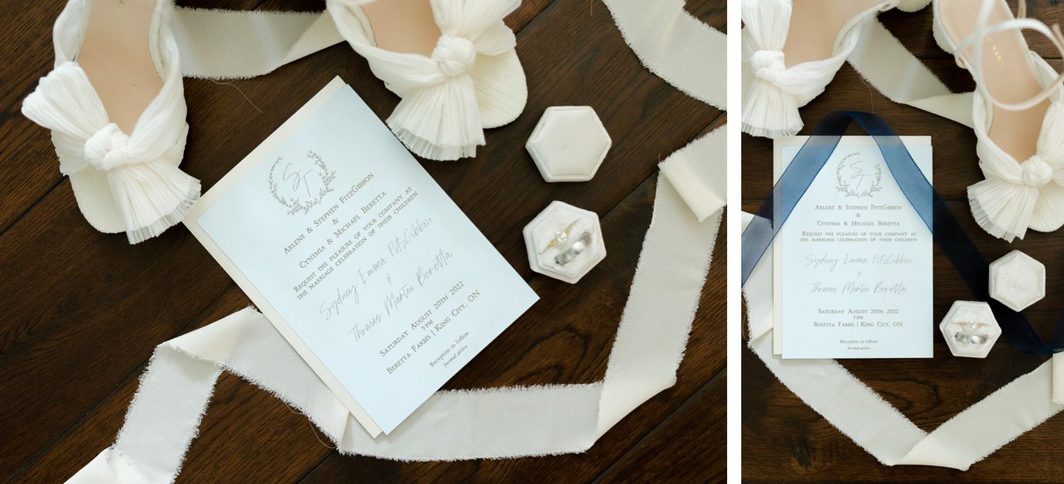 Wedding invitation suite with hexagonal details and white ribbon on dark wood background.