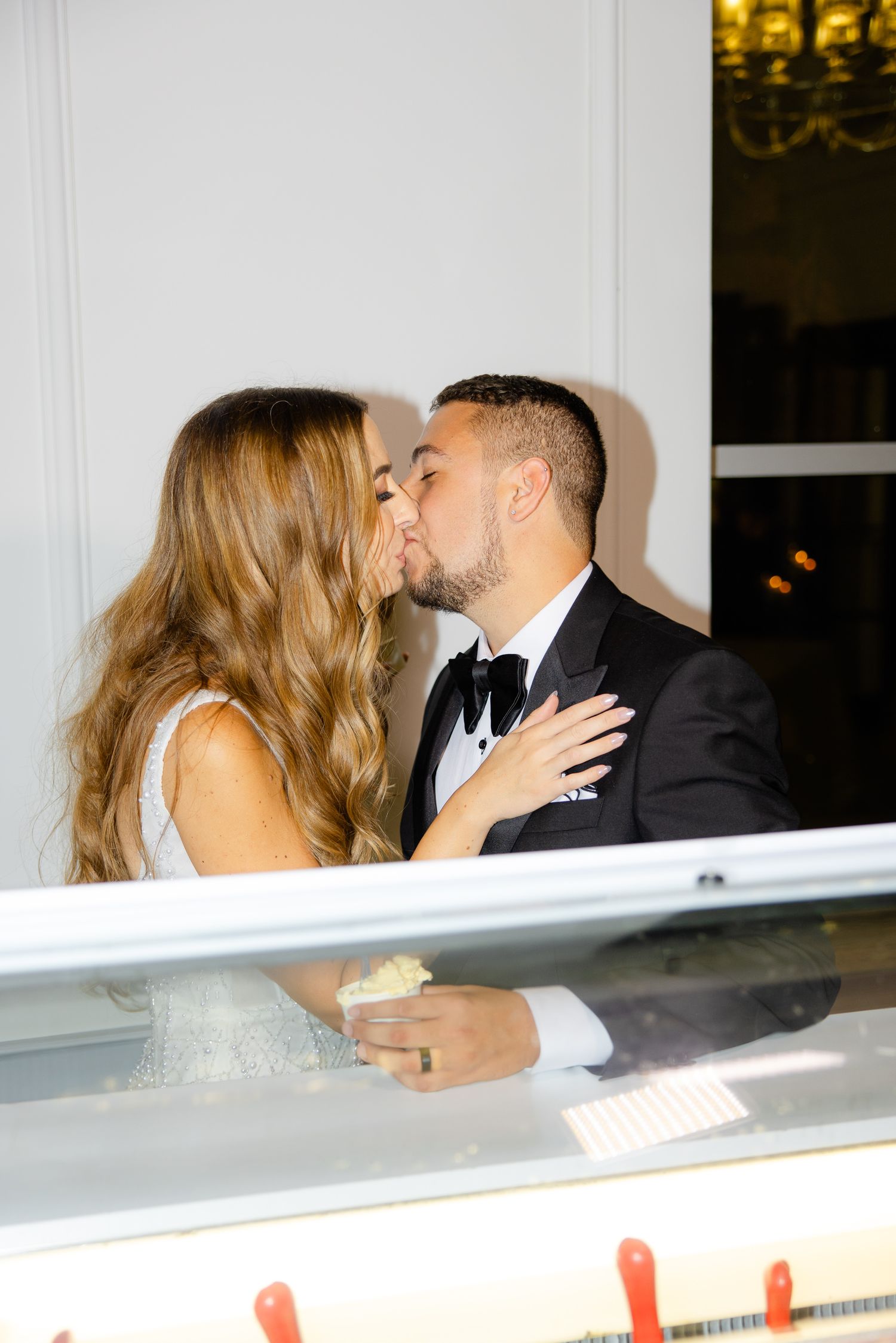 Romantic moment shared over gelato at an elegant dessert station.