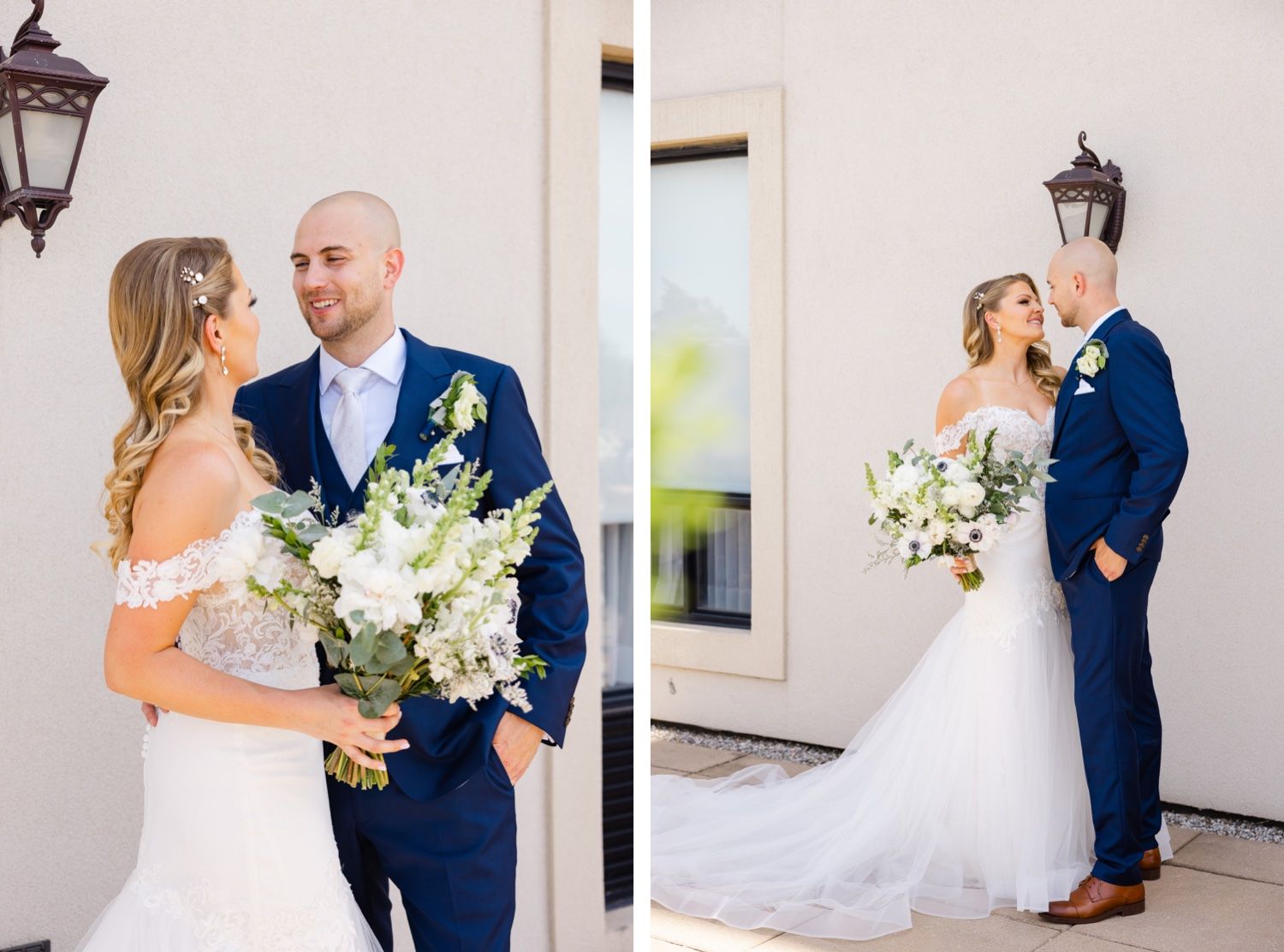 Romantic wedding portraits showing couple in navy suit and off-shoulder gown against cream building.