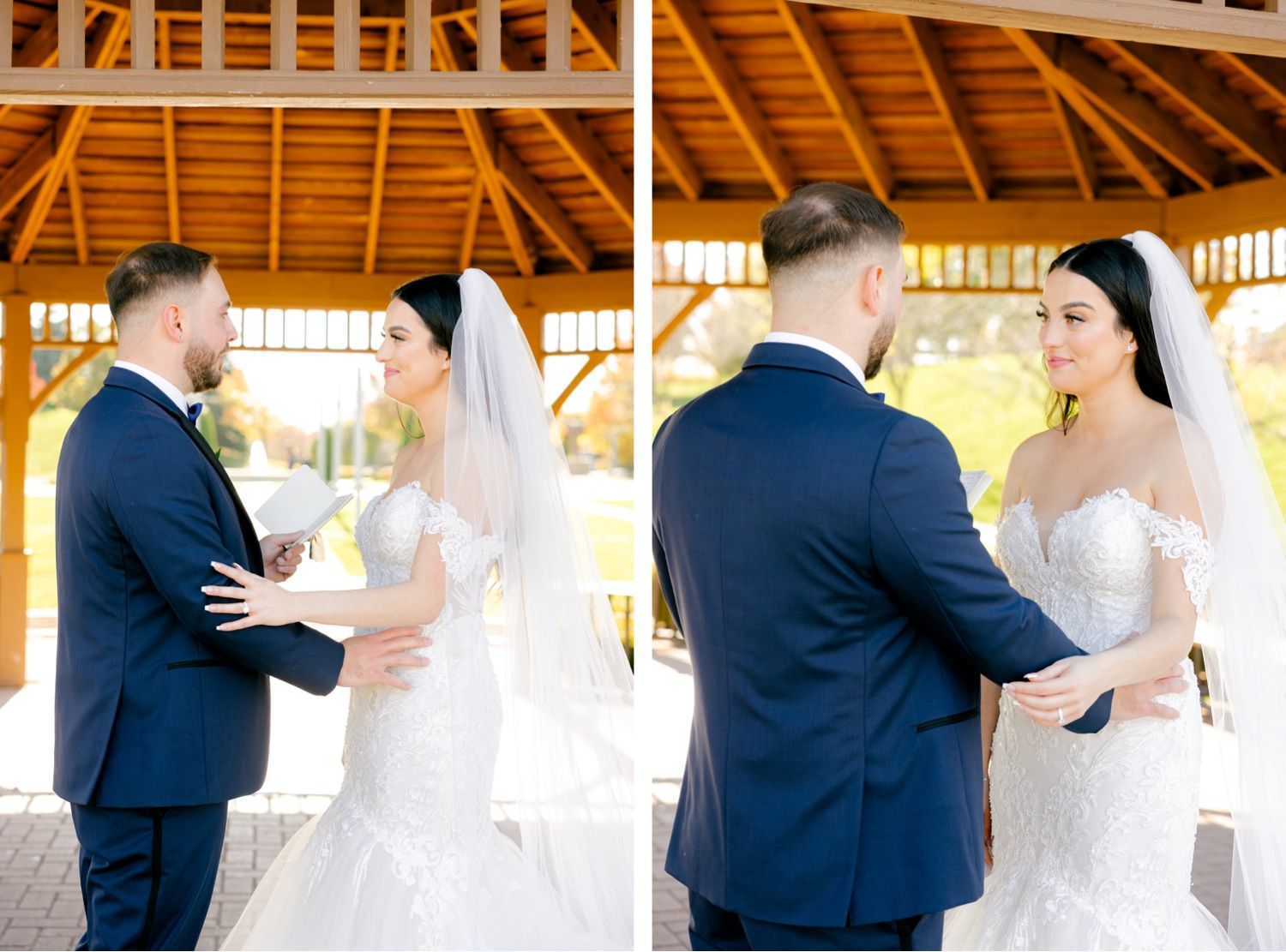 Wedding couple embraces under rustic wooden pavilion during their first look.