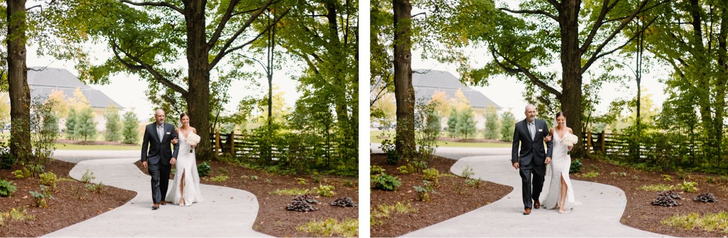 Couple walking together on curved garden path during wedding day photoshoot.