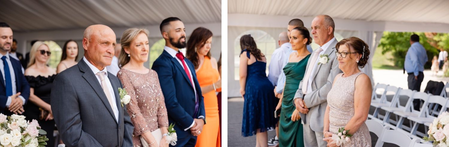 Wedding guests attend an outdoor ceremony under a white tent canopy.