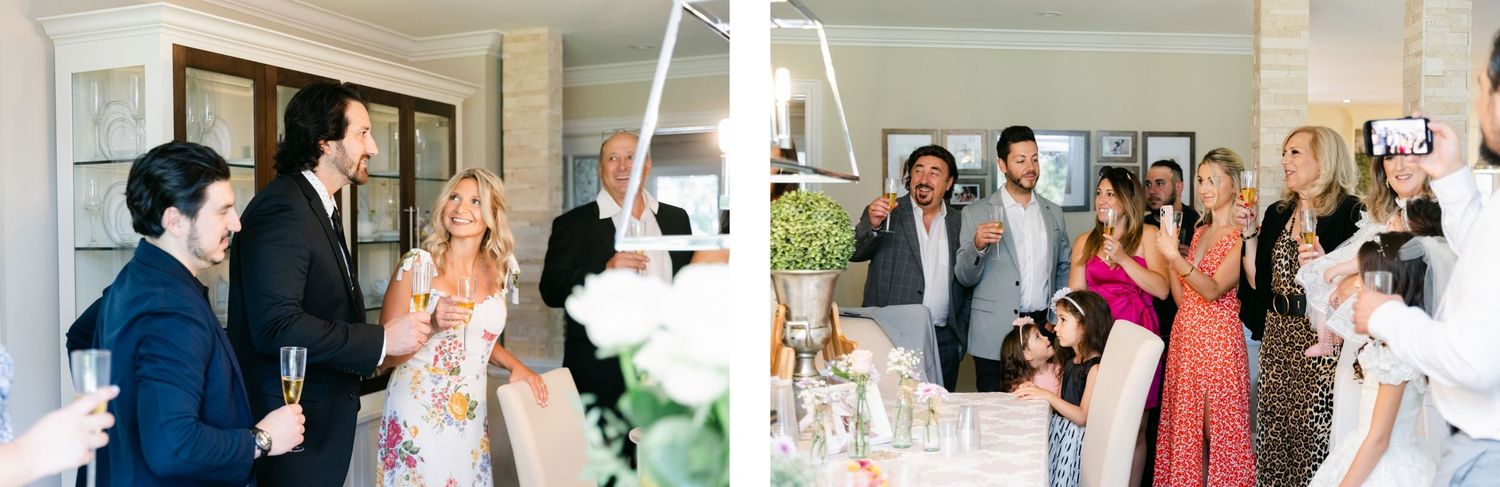 Indoor celebration showing guests mingling and toasting at an elegant event.