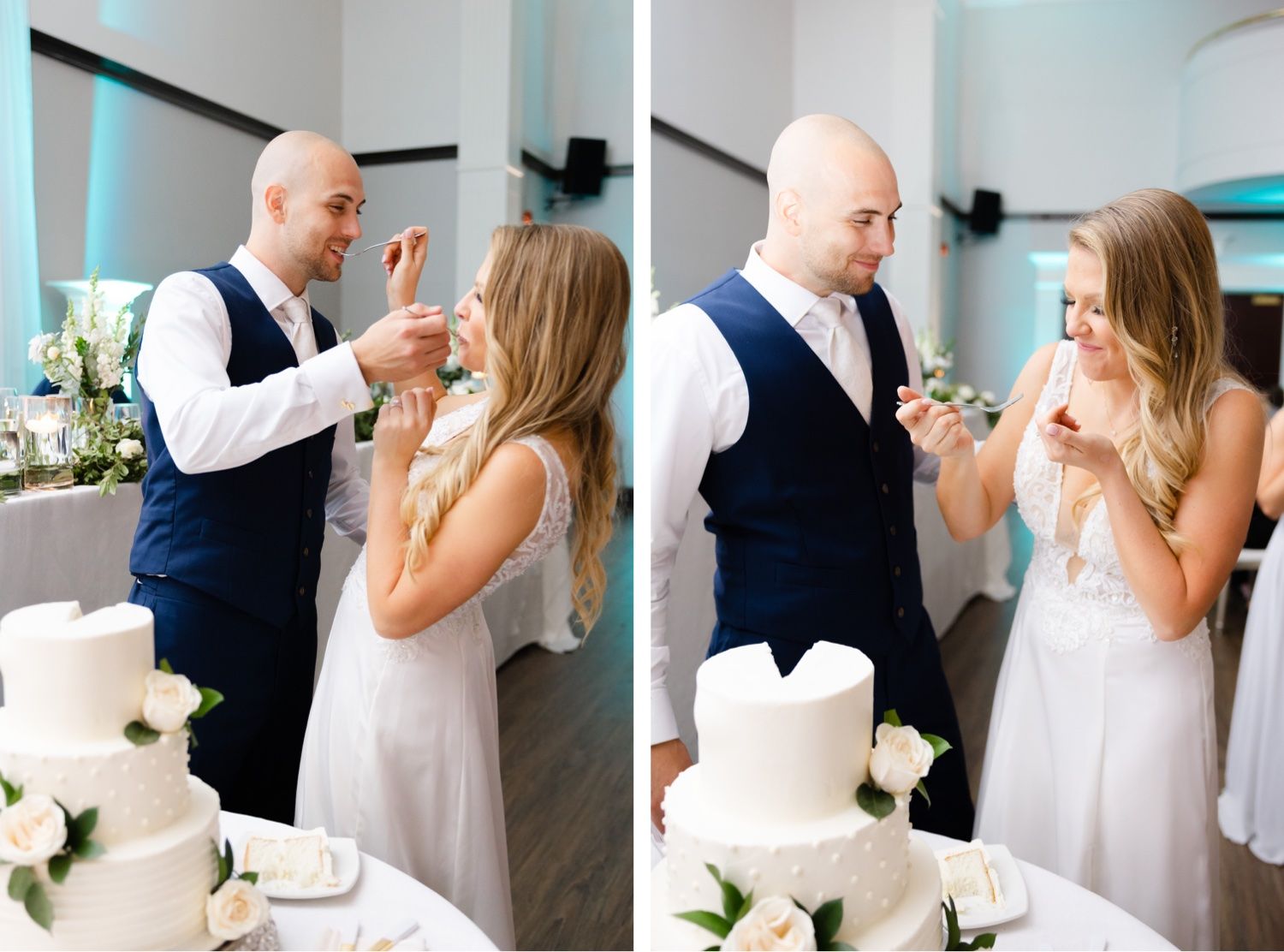 A couple shares a joyful moment while tasting their wedding cake during the reception.