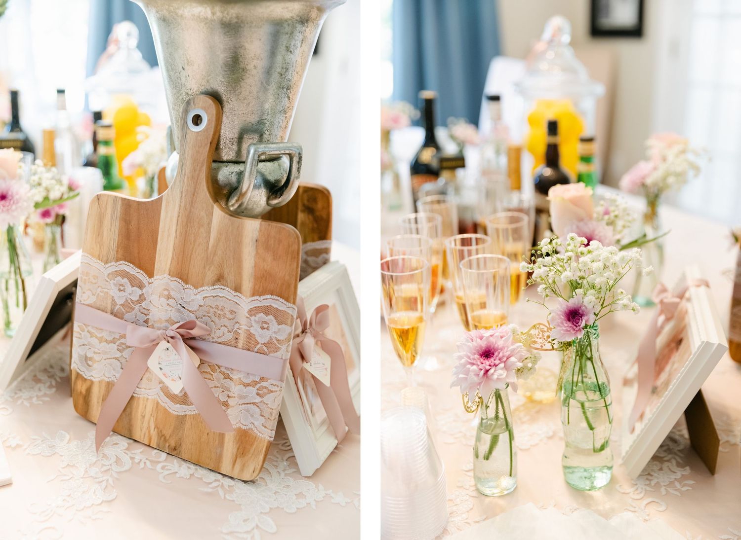 Wedding reception table setup with rustic wooden decor, lace details and delicate pink flowers in glass vases.
