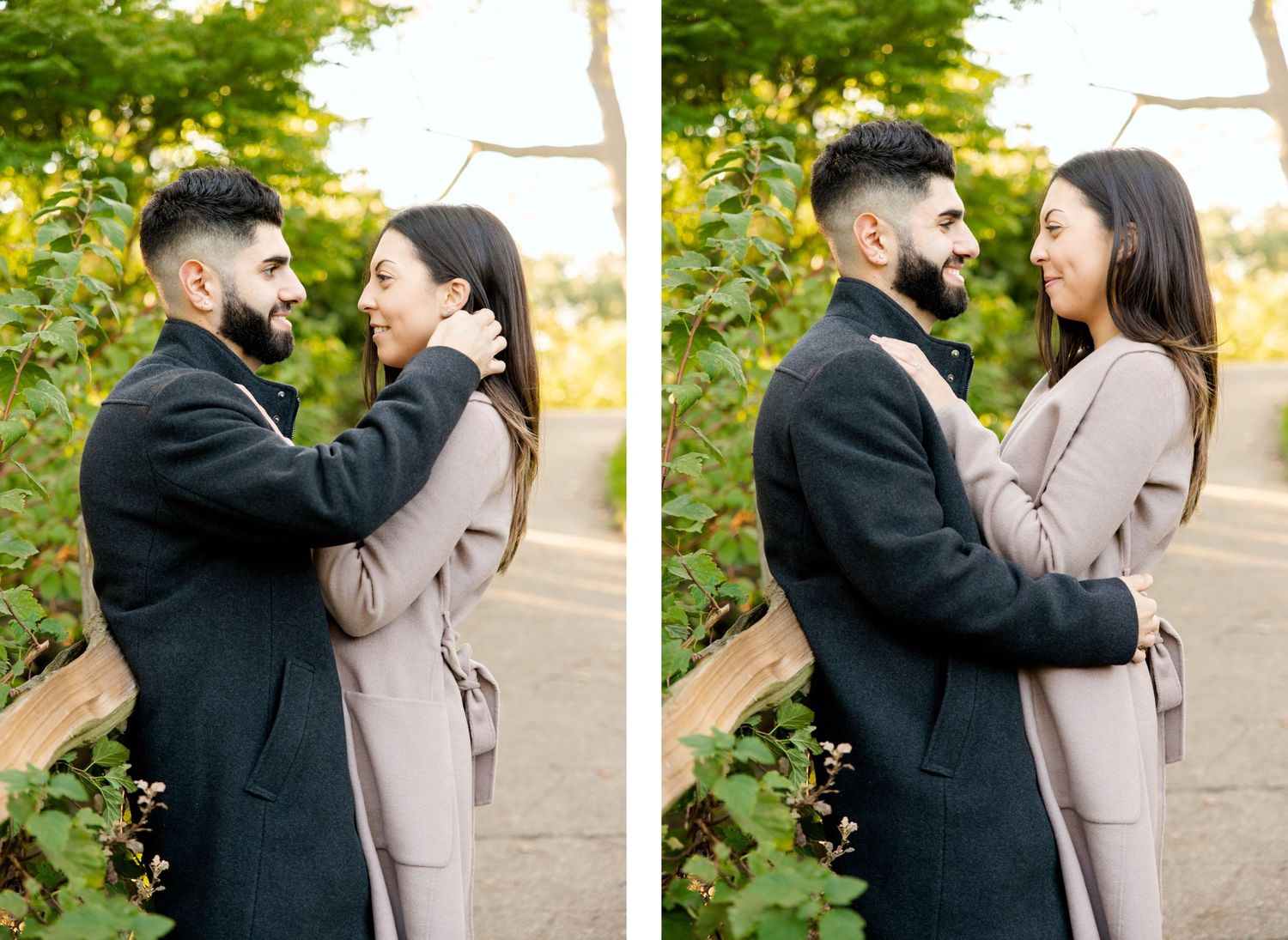 Couple in winter coats sharing an affectionate moment in a garden setting.