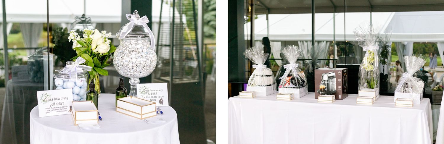 Wedding reception welcome table with white decor and guest book display.
