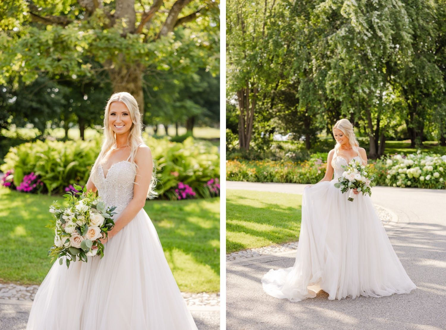 A bride stands on a garden path wearing a tulle wedding gown and holding a lush floral bouquet.
