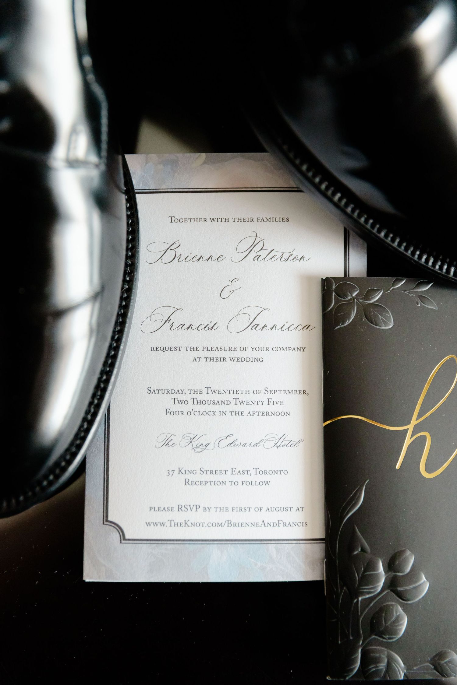 Elegant wedding invitation cards with calligraphy text and floral designs shown in a series of close-up detail shots.
