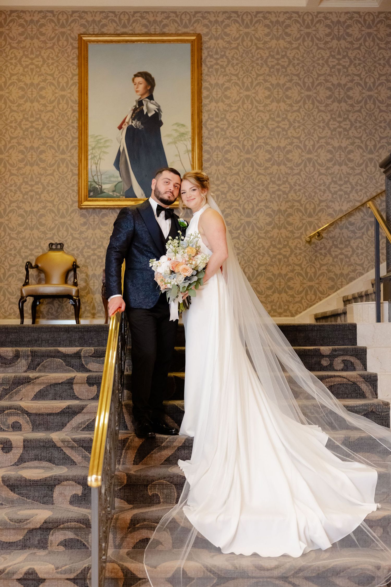 A romantic wedding sequence showing a couple in elegant attire sharing intimate moments against an ornate wallpapered backdrop.