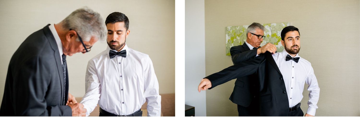 Two men in formal attire having a candid moment while getting ready for a special event.