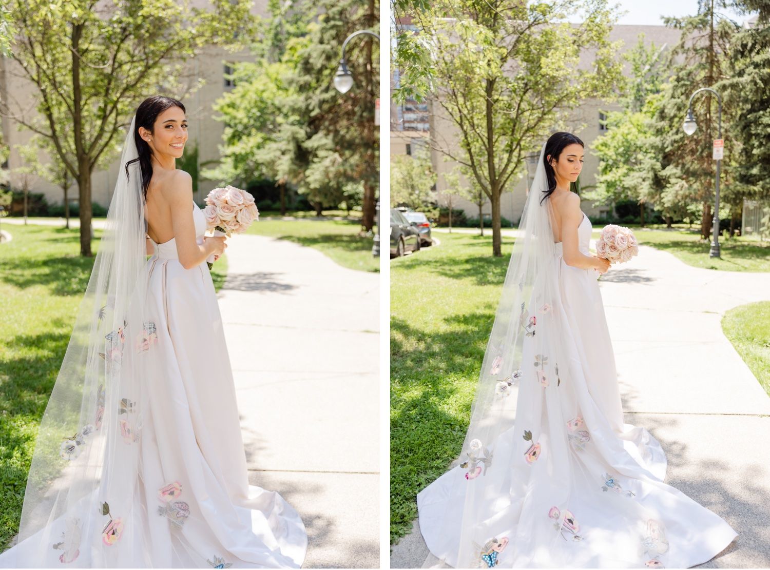 Bride in white gown with long train and veil poses for portraits in sunny garden.