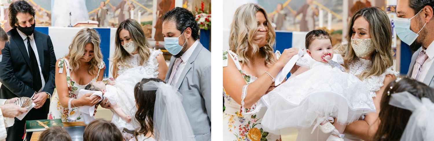 A baptism ceremony with attendees wearing protective masks in a church setting.