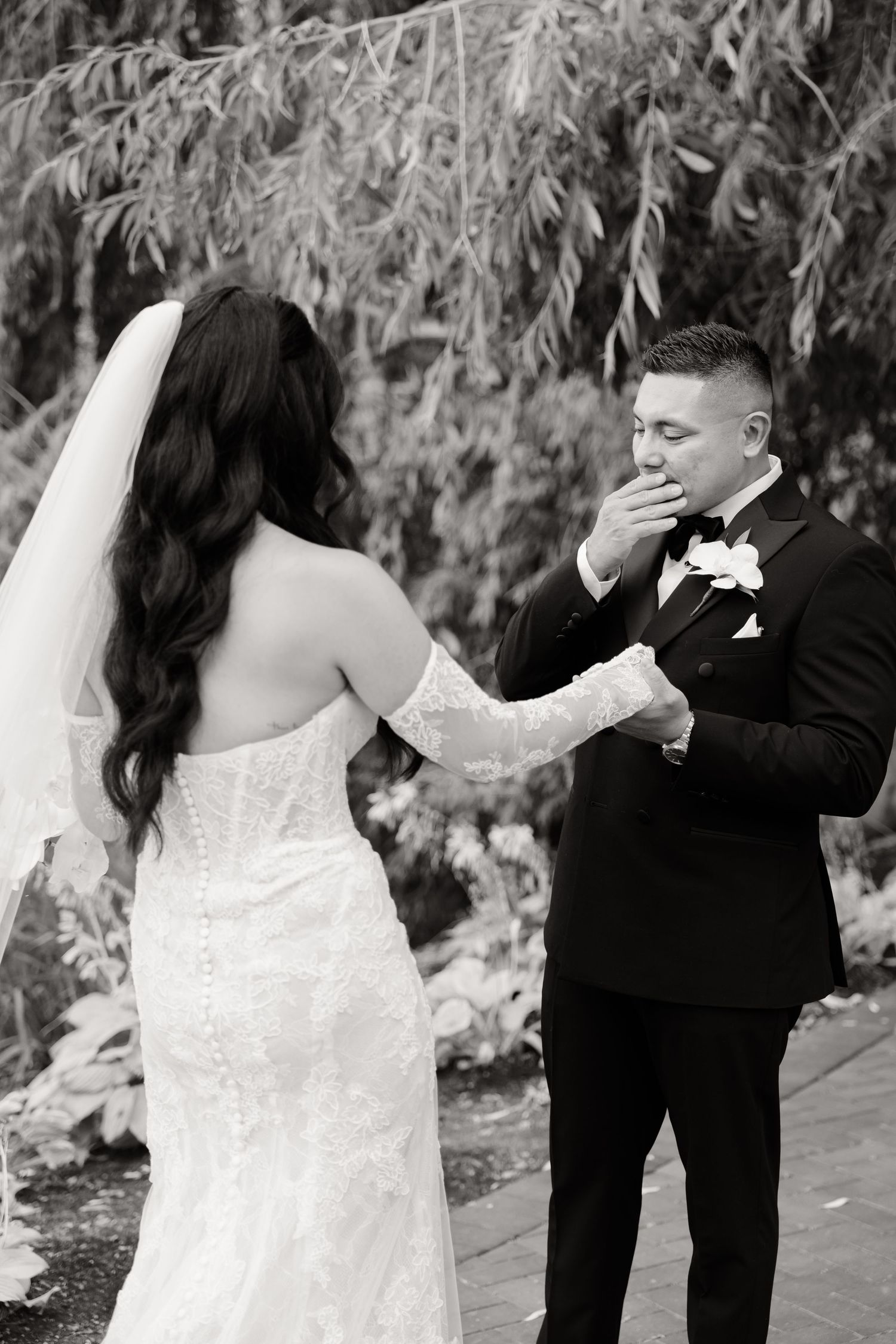 A sequence of candid wedding moments capturing dancers in elegant attire beneath overhanging tree branches.