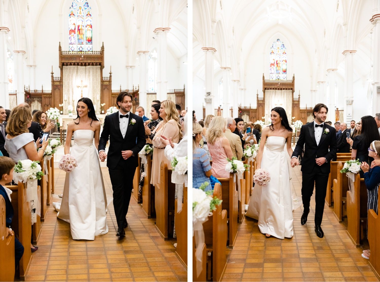 A couple walks down the church aisle while wedding guests smile from the pews.