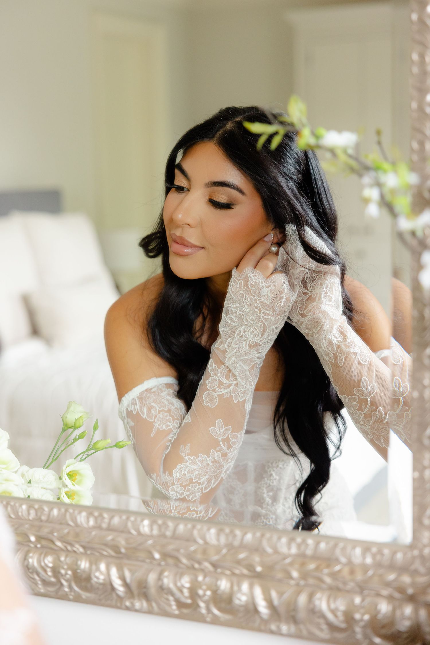 Beautiful bridal portrait sequence captured in soft window lighting showing delicate lace details.