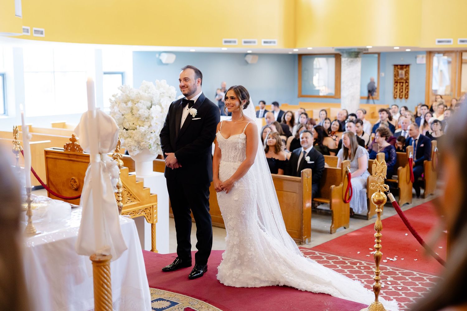 A series of wedding ceremony photos showing a church aisle, couple exchanges during the ceremony, and formal poses.