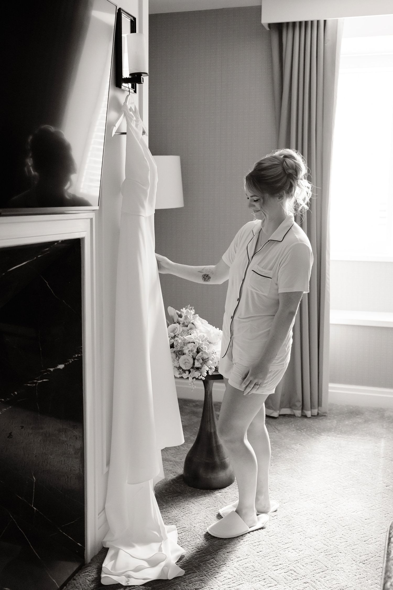 Black and white photo sequence showing a wedding dress being adjusted in a sunlit room.