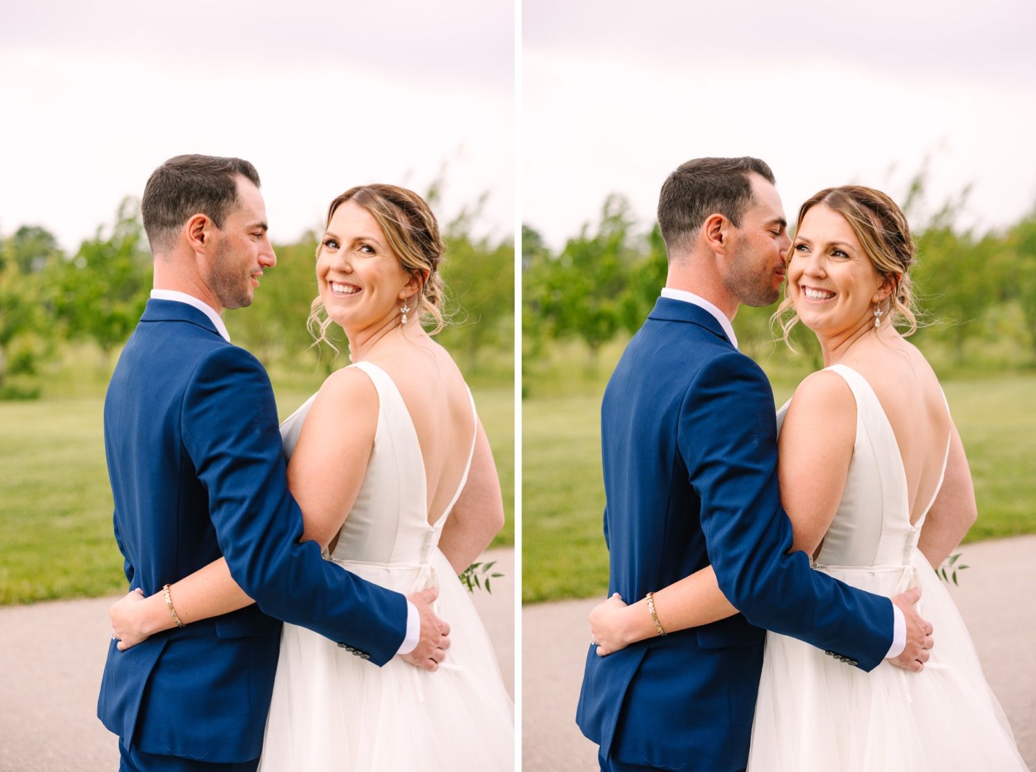 A couple embraces during their wedding photoshoot against a scenic outdoor backdrop.