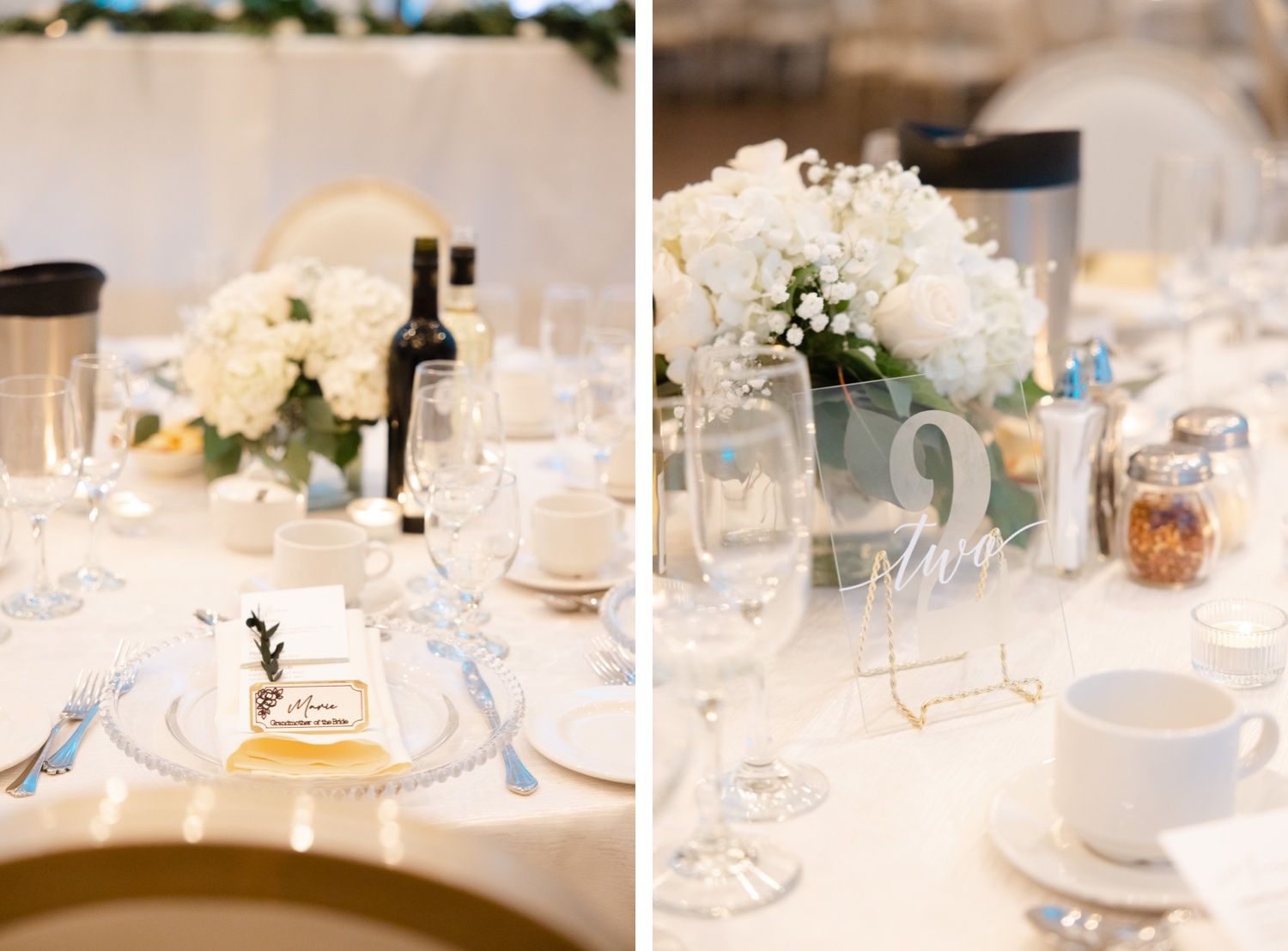 White floral centerpieces and place settings arranged on round wedding reception tables.