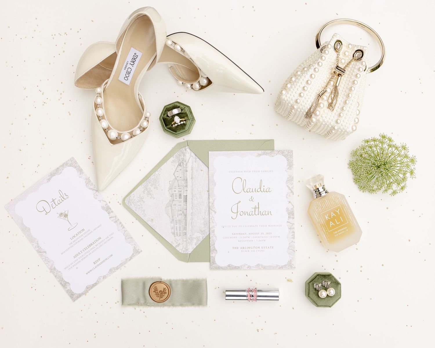 A curated collection of elegant neutral-toned wedding invitations with envelopes and decorative elements.