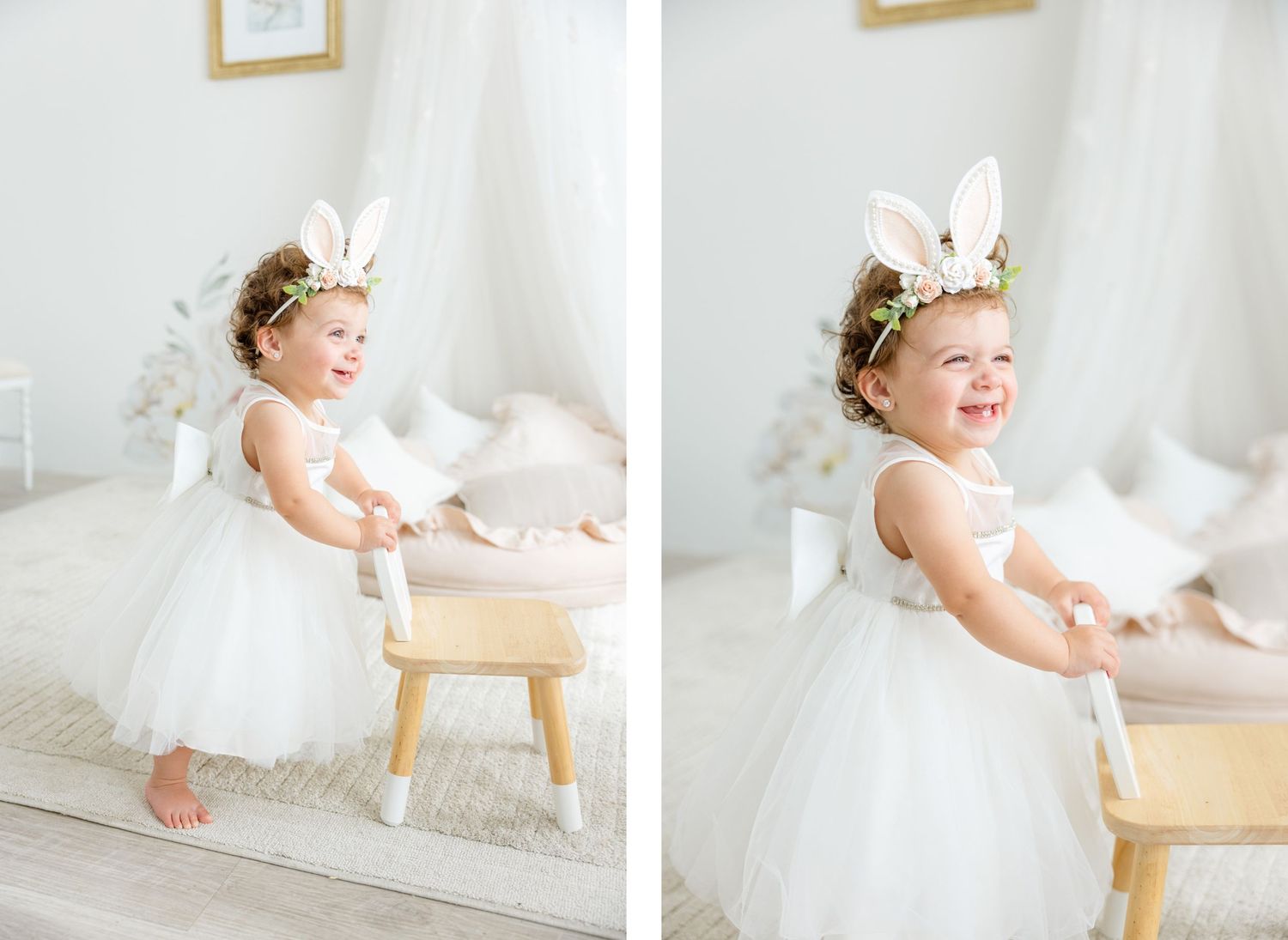 Playful nursery moment with white dress and bunny ears against wooden stool.