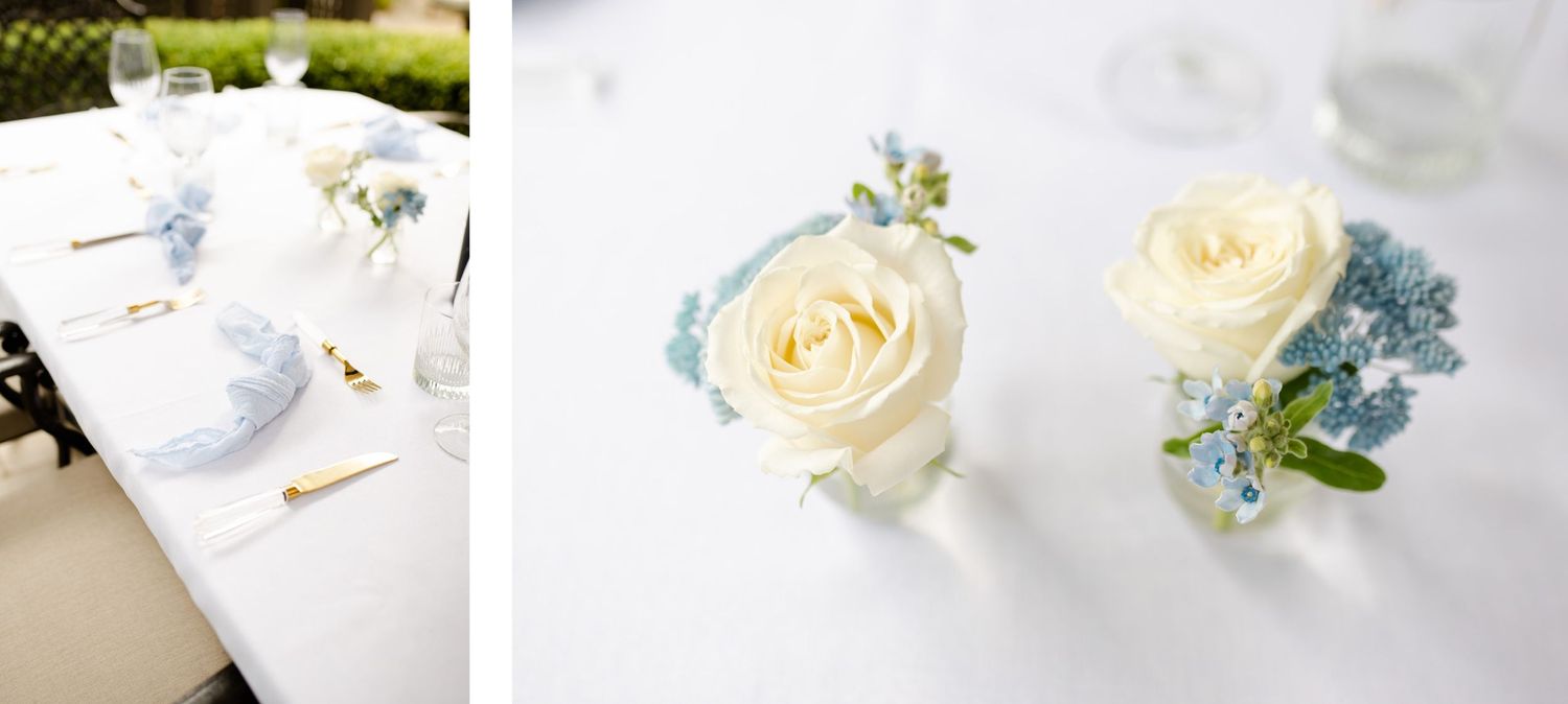 White roses with delicate blue flowers arranged as table decorations.