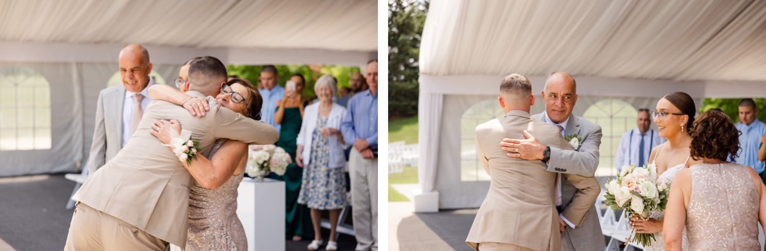 Emotional embraces and celebrations during a tented wedding ceremony with formal attire.