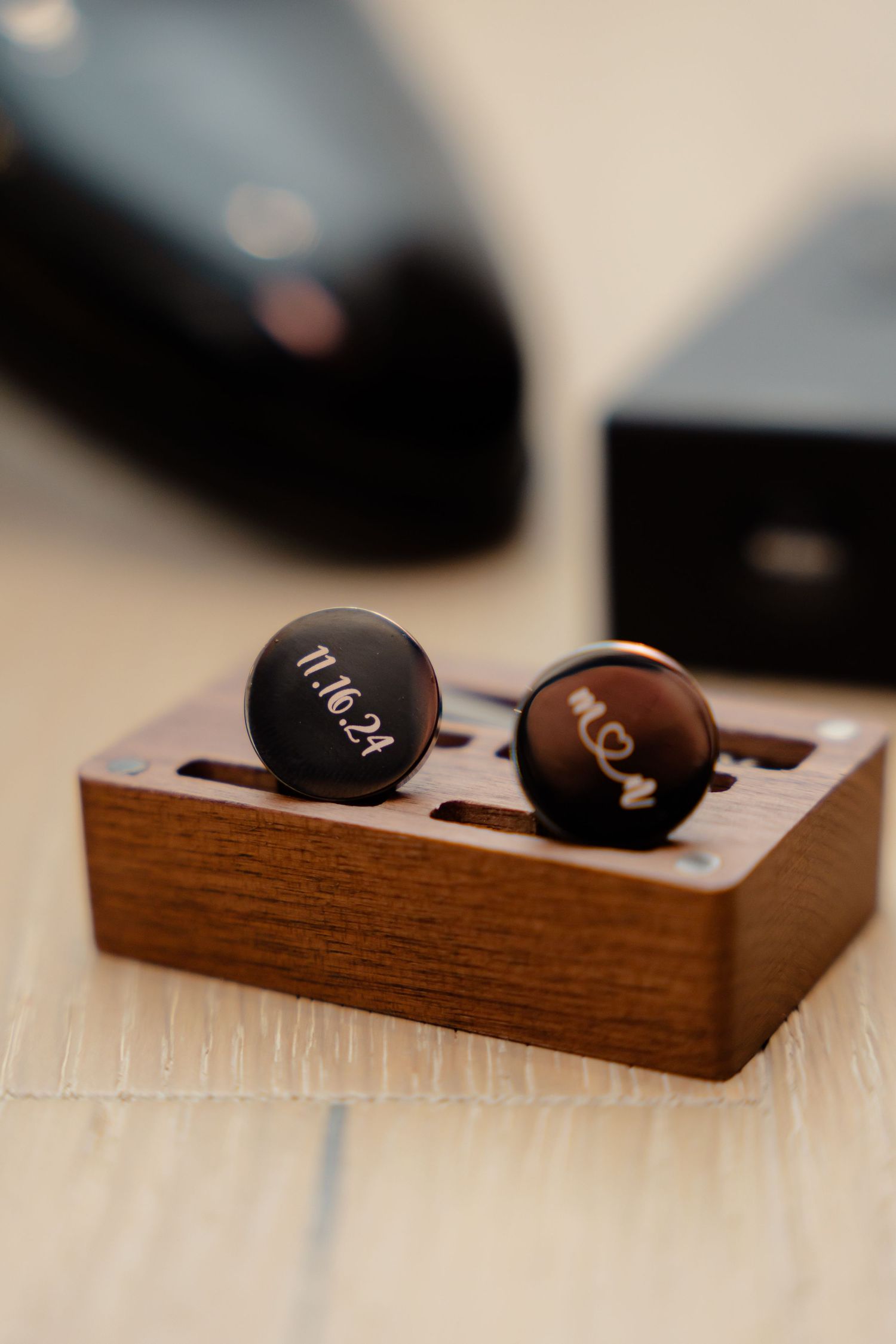 Custom engraved cufflinks in wooden presentation box.