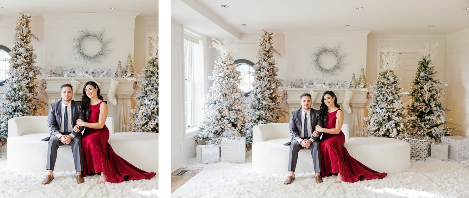 Romantic Christmas couple portrait with flocked trees and holiday decor in the background.