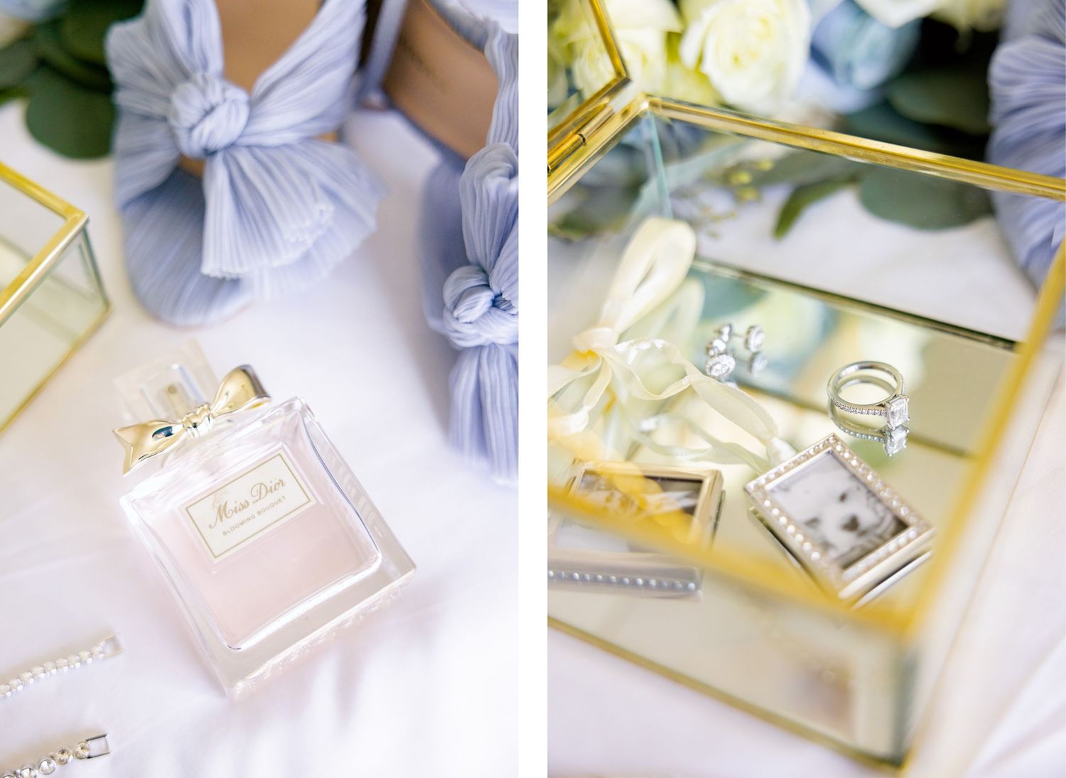 Elegant perfume bottles and wedding accessories arranged on mirrored surface with soft lighting.