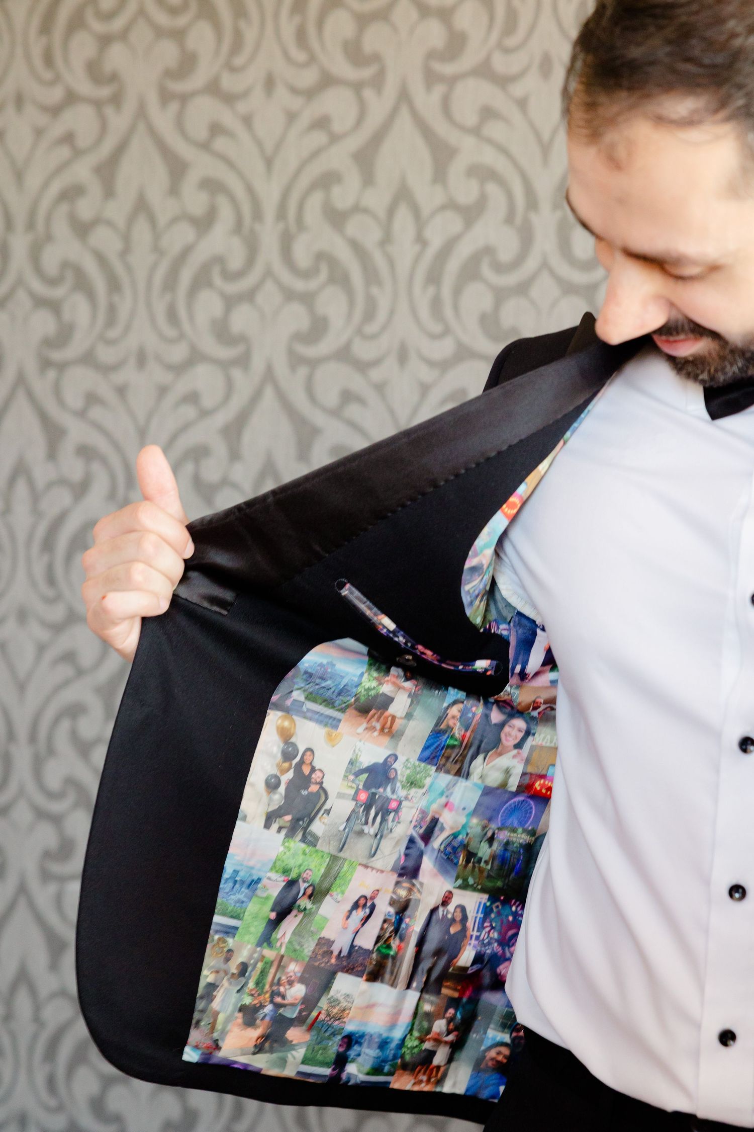 Close-up of personalized photo collage lining inside formal black jacket.