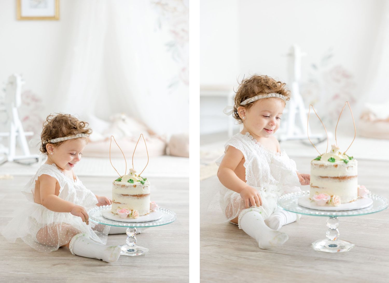 Two photos of a toddler in white lace playing with an elegant birthday cake on a glass pedestal.