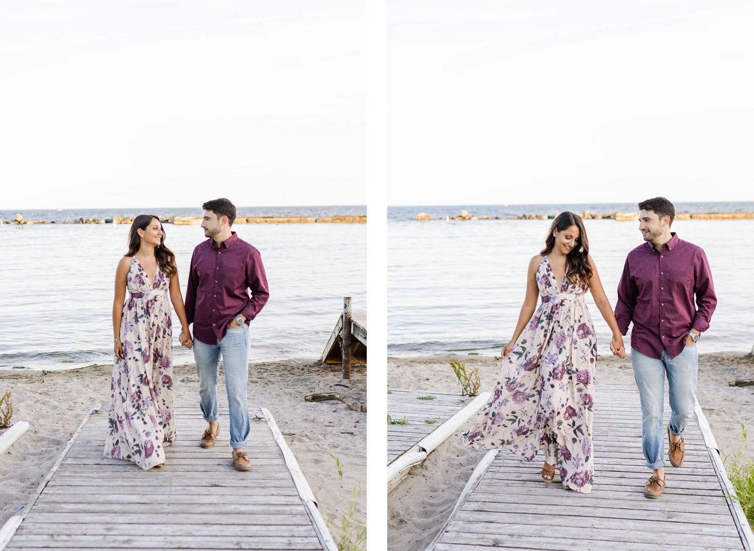 Couple walking together on a wooden boardwalk by the water.