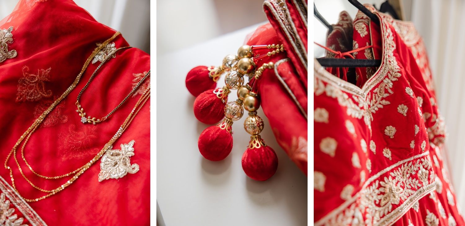 Close-up details of red Indian wedding attire with gold embellishments and tassels.