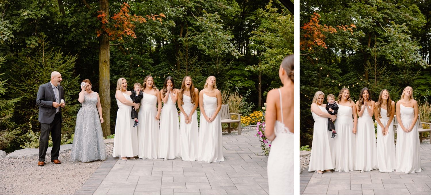 Outdoor wedding ceremony scene with wedding party on wooden deck.