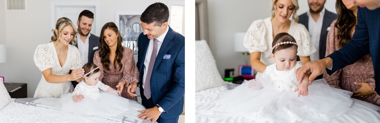 People in formal attire gathered around a bed during a celebration.