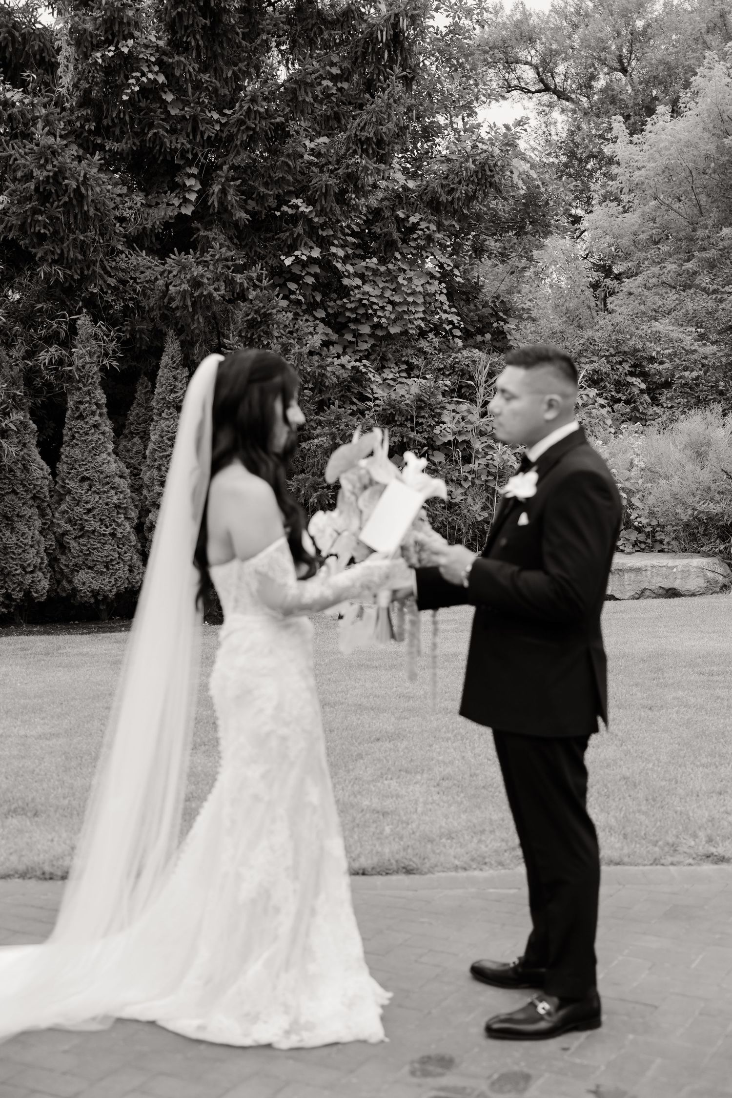 Sequence of black and white wedding photos showing a couple during an intimate outdoor ceremony.