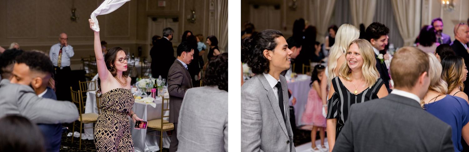 Reception guests celebrating and socializing during a festive wedding party.