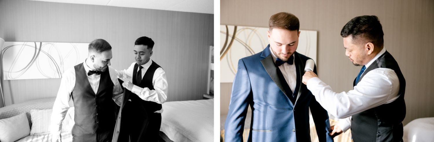 Two people assist with wedding day preparations in a hotel room.