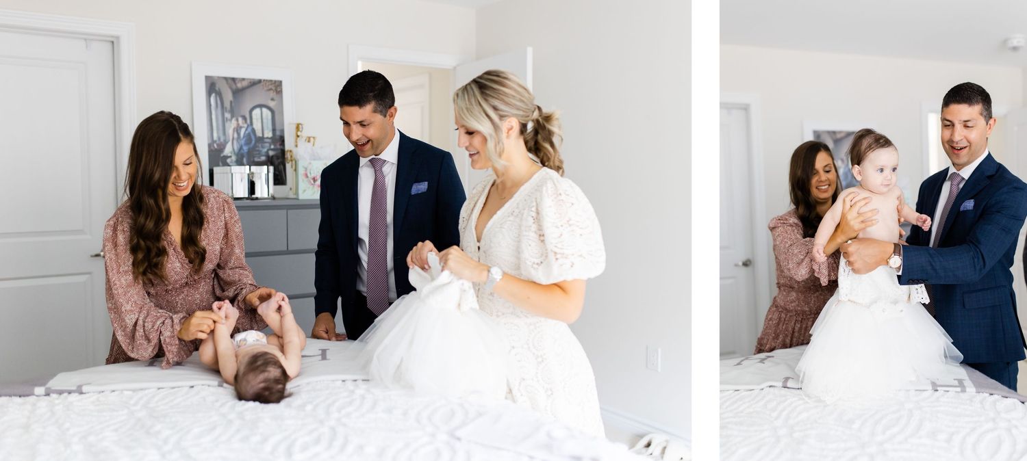 People gathered in formal attire around a bed during a special event.