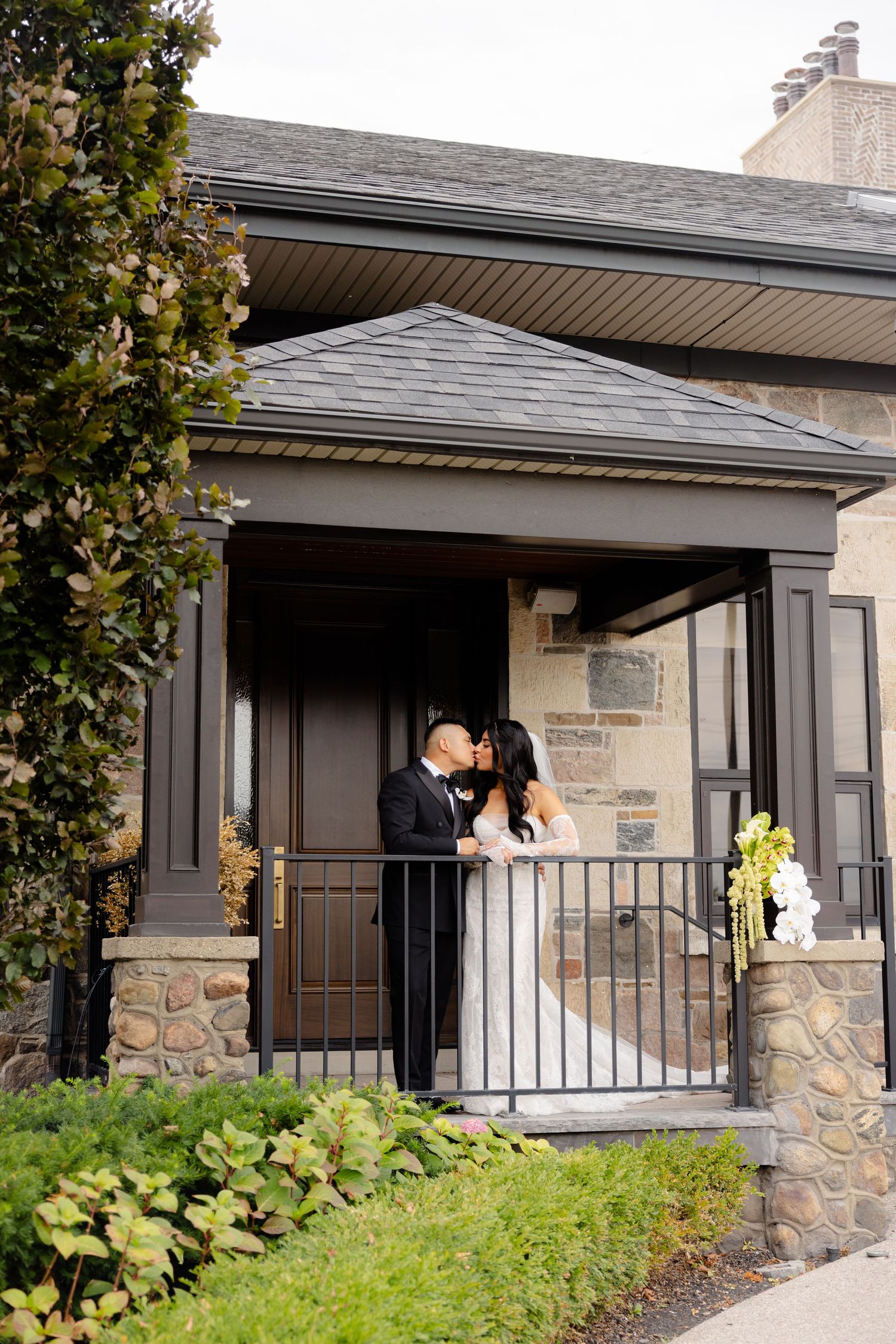 Series of images showing the entrance to a stone and brick building with a covered porch area.