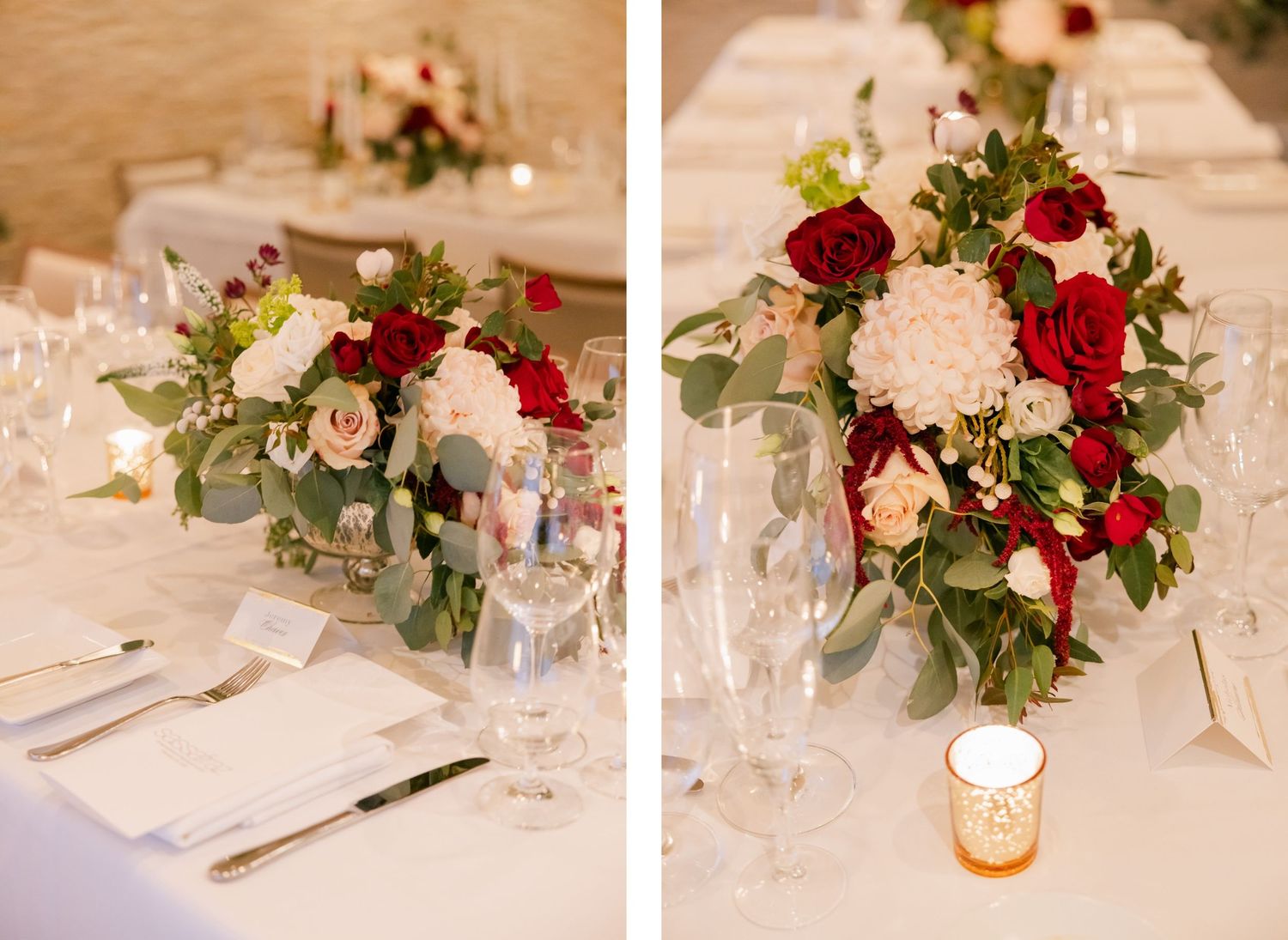 Red and white floral centerpieces with greenery adorn elegant wedding reception tables.