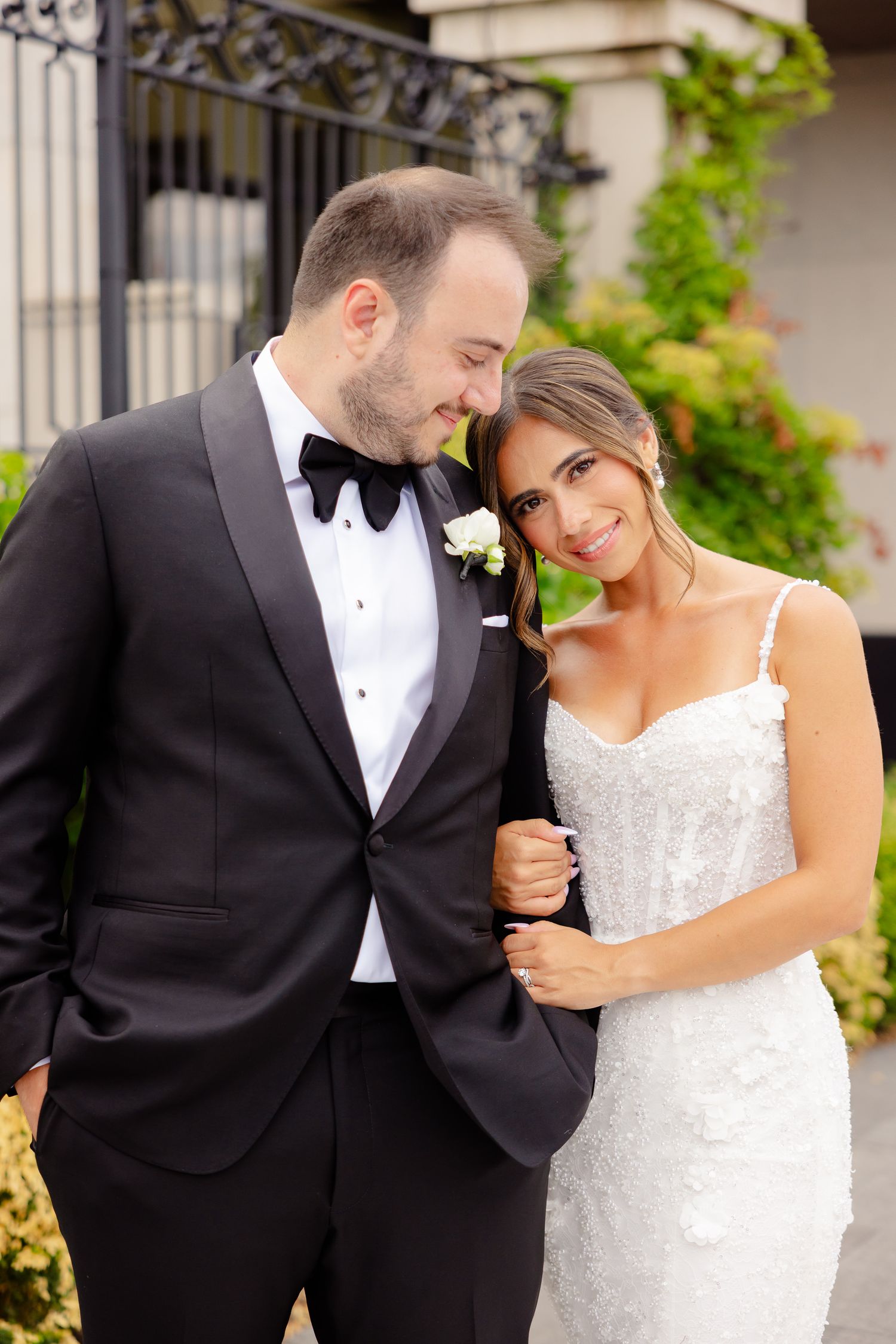 Sequence of wedding photos showing tender moments between newlyweds in formal attire outdoors.