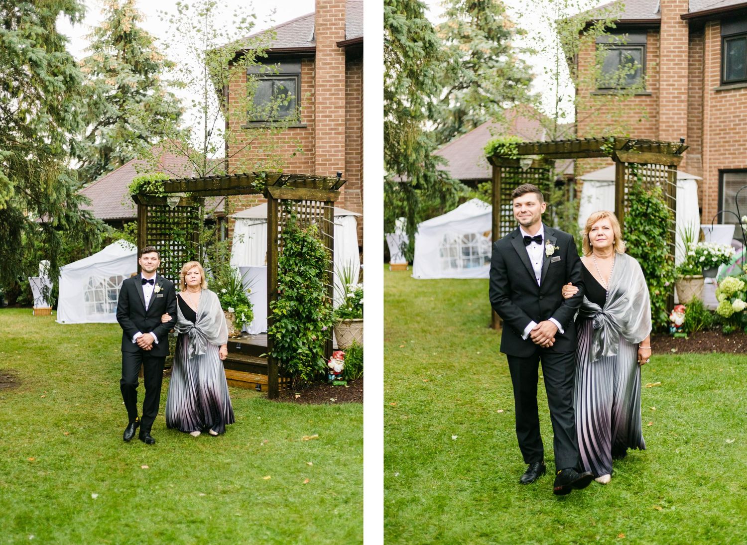 Wedding party poses by ivy-covered archway in a garden setting.