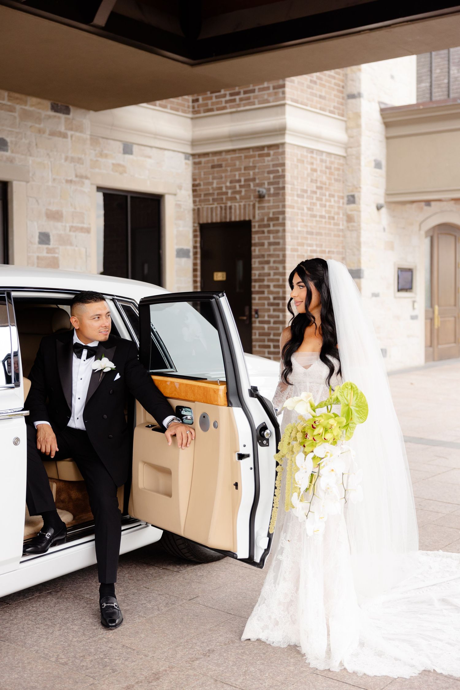 A wedding couple enters their limousine in a series of sequential photos showing them getting into the white car.