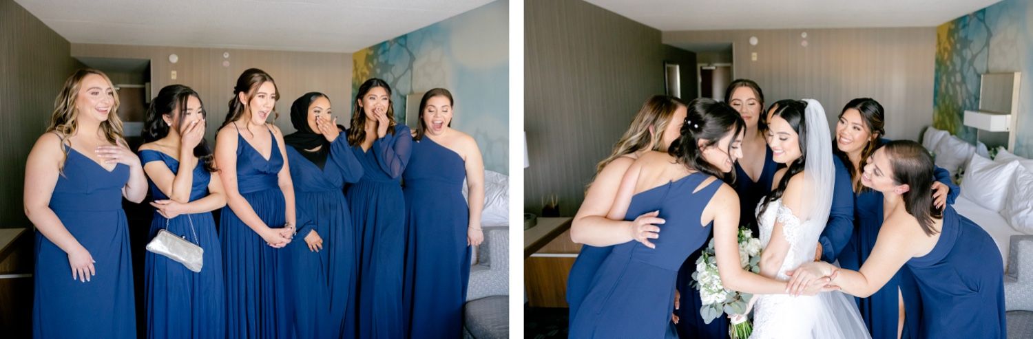 Bridesmaids in royal blue dresses share joyful moments during wedding preparations.