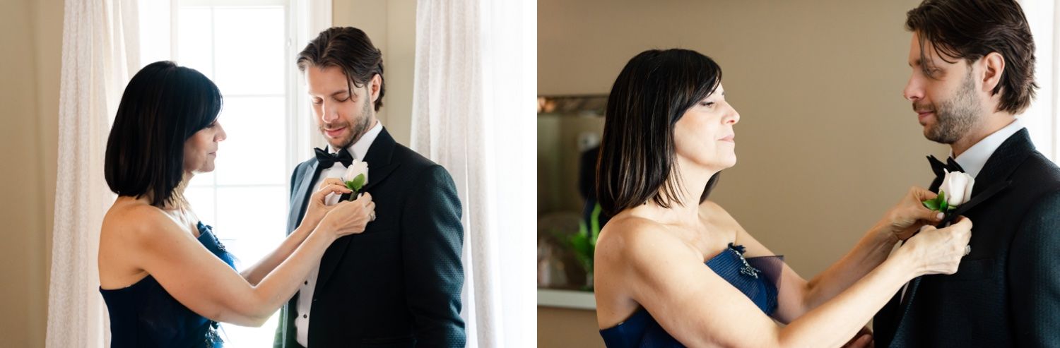 A couple helps with adjusting formal attire before a special occasion in an indoor setting.